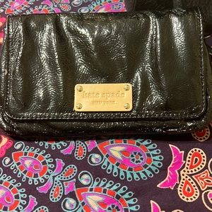 Kate Spade black clutch purse with straps.